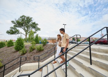 Patient and Parent walking outside